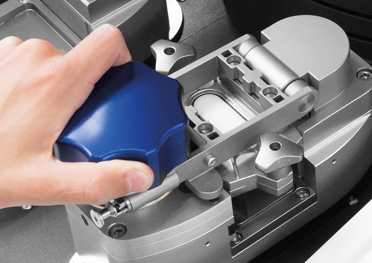 Placing a grinding jar into the Emax high energy ball mill
