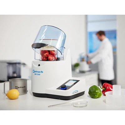 GM 200 Grindomix knife mill in a lab with fresh food samples