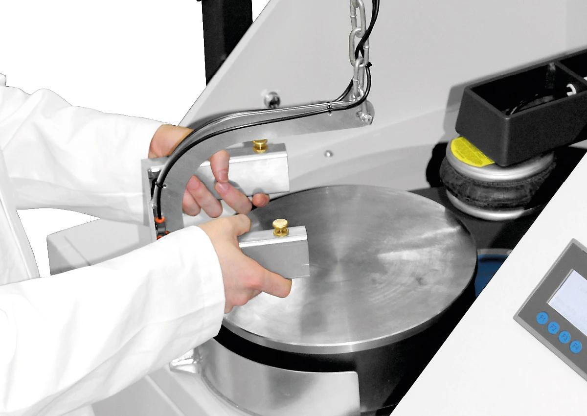 Placing a grinding set into the RS 300 vibratory disc mill